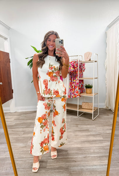 Floral Print Sleeveless Peplum Top