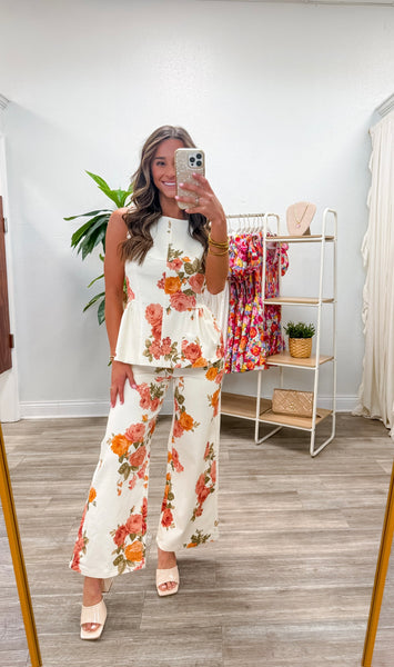 Floral Print Sleeveless Peplum Top