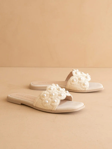 The Cathleen Pearl Raffia Slide Sandal