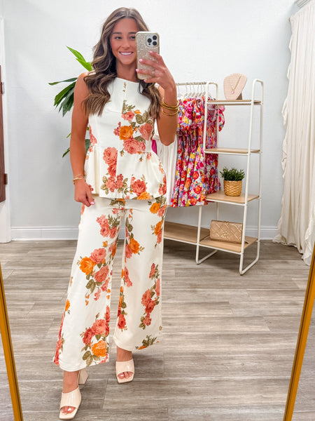 Floral Print Sleeveless Peplum Top