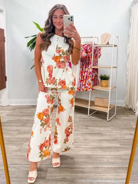 Floral Print Sleeveless Peplum Top